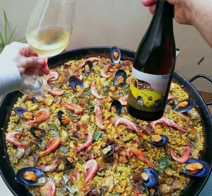 Barbecue or paella and tasting of 3 wines